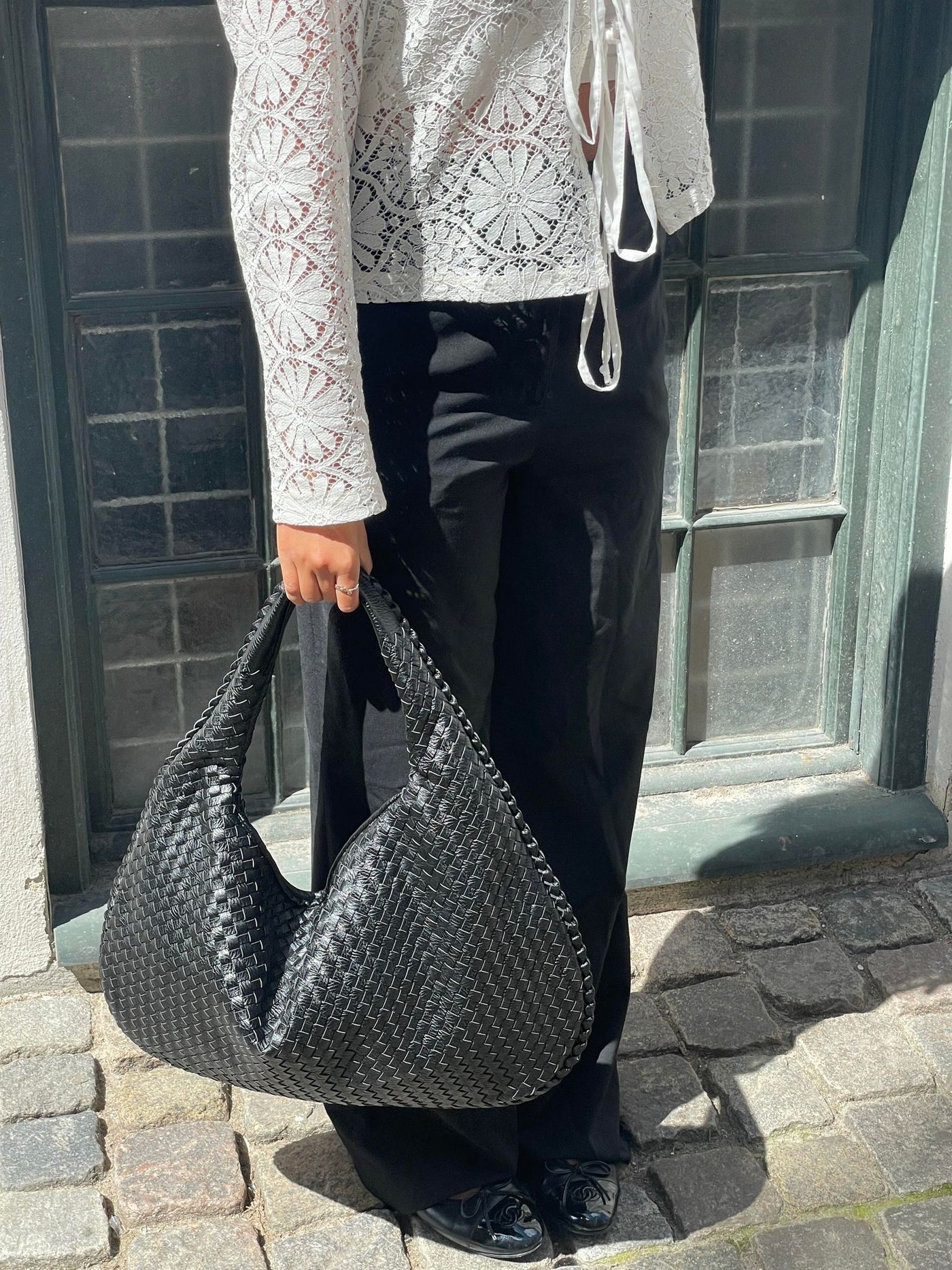 Trendige geflochtene Tasche