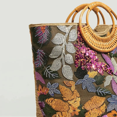 Schicke Handtasche mit dekorativem Blumenhenkel für Frauen