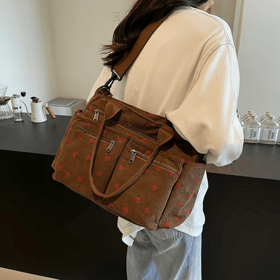 Bestickte Cord Tasche mit Struktur und liebevollen Details für Frauen