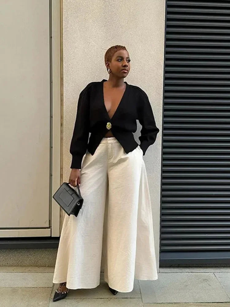 Brand & Belle | Eleganter Cardigan mit goldener Knopfverschluss