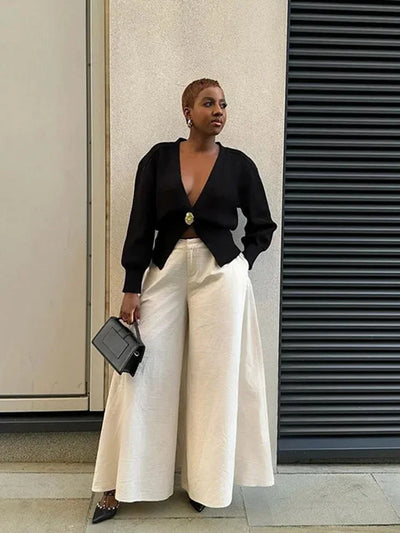 Brand & Belle | Eleganter Cardigan mit goldener Knopfverschluss