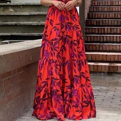 Langes Damenkleid mit Blumendruck und offenem Rücken - Mariluz