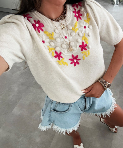 Bluse mit Blumenstruktur und romantischer Eleganz für Frauen