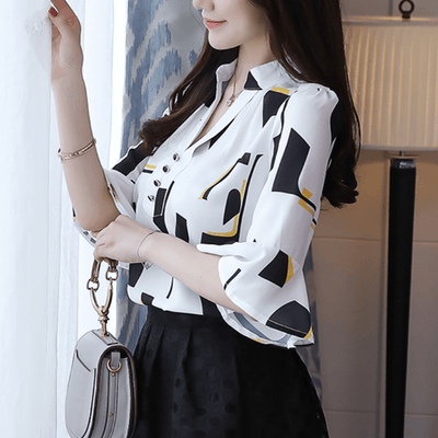 Halbarmige Damenbluse mit eleganter Schlichtheit